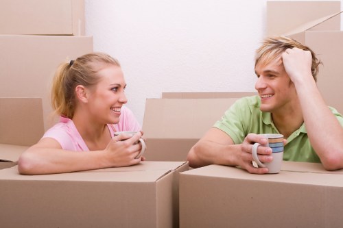 Packed moving boxes and furniture ready for transport