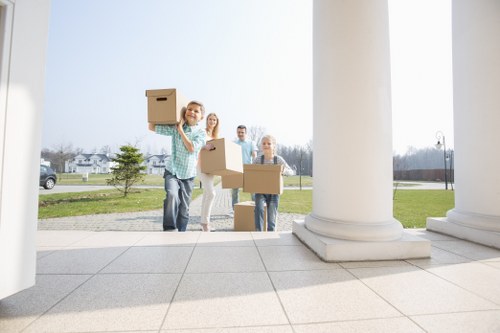 Boxes and furniture loaded into a moving van