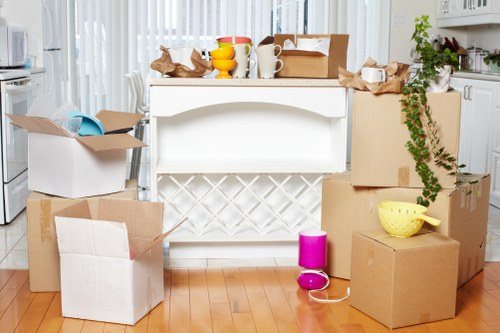 Boxes and furniture arranged for a smooth flat relocation in Ruislip