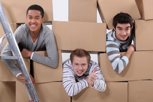 Packed boxes and furniture ready for urgent removal service