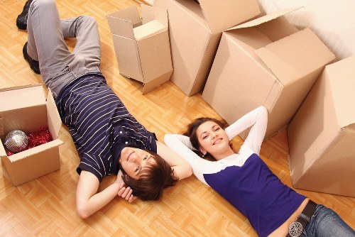Student property move with boxes, bags, and furniture prepared for transport
