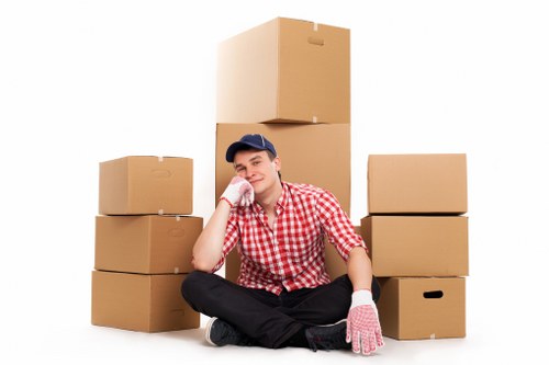 Careful loading of student belongings for a move in Ruislip